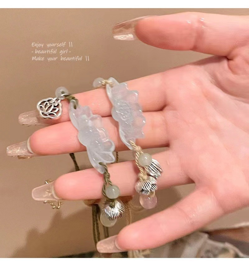 新中式古风编织莲花抽拉手链女2024年新款轻奢小众仿玉髓串珠手饰详情2