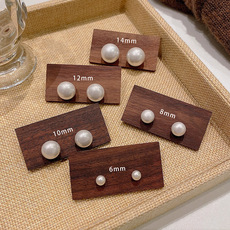 925 Silver Needle Sparkling Diamond Snowflake Pearl Earrings, a light luxury and niche design, high-end stud earrings, a retro and elegant ear accessory pic 3