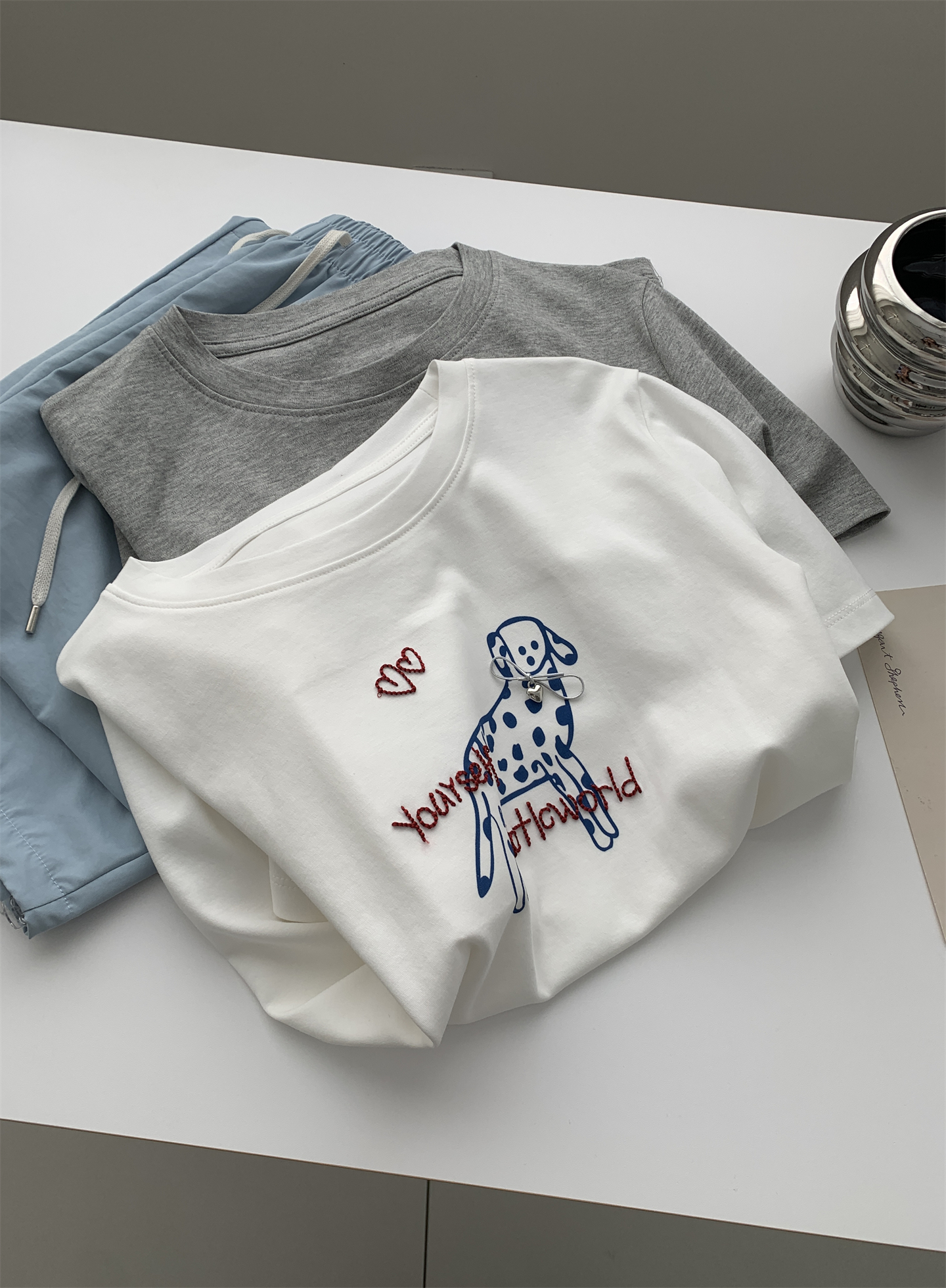 A trendy Korean-style loose and casual short-sleeved T-shirt with a bow and spotted dog print for women in summer, featuring pure cotton embroidery pic 12