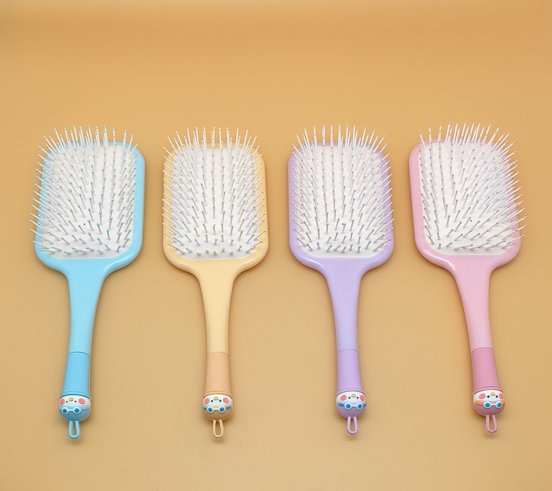 新款女生专用可爱卡通硅胶软头大方头气垫梳 蓬松造型气囊梳圆滚排骨梳 烧烤刷款式梳子详情2