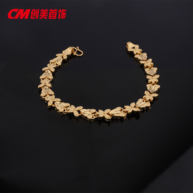 Chuangmei Jewelry offers wholesale 24K gold-plated heart-shaped butterfly bracelets for women, featuring a retro ethnic style and a luxurious wedding accessory pic 7