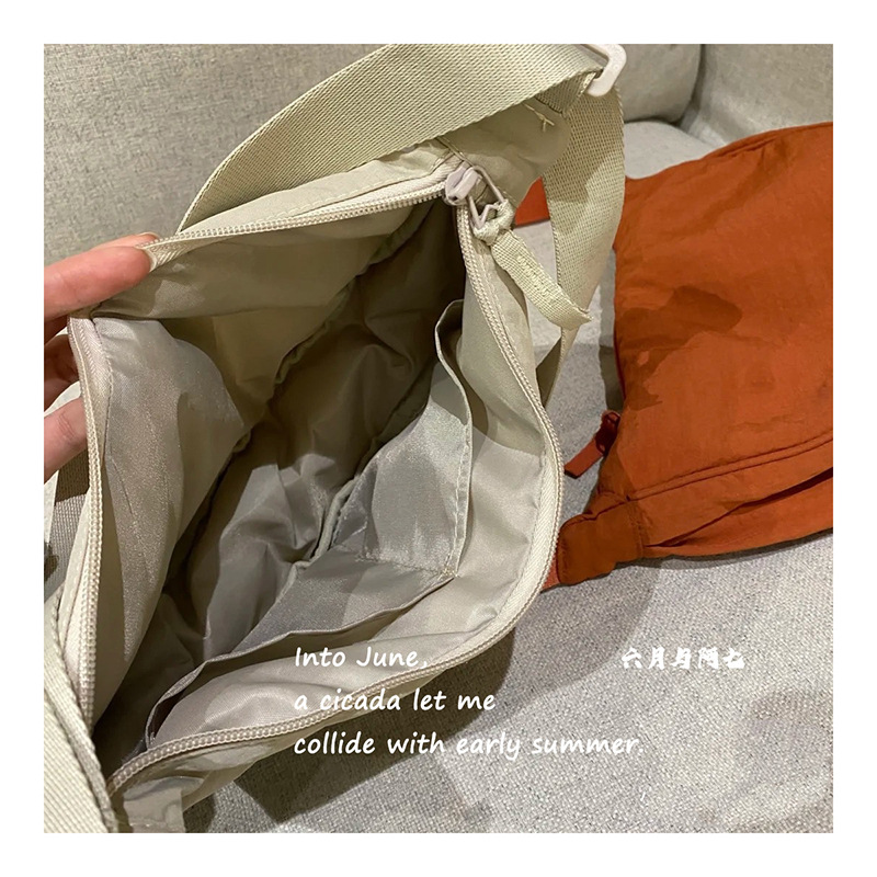 U家试衣间同款女斜挎包小红书尼龙饺子包学生单肩包布包工厂货源详情17