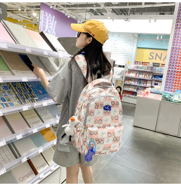 简约校园休闲背包2023韩版大容量休闲双肩包日系个性涂鸦学生书包详情6