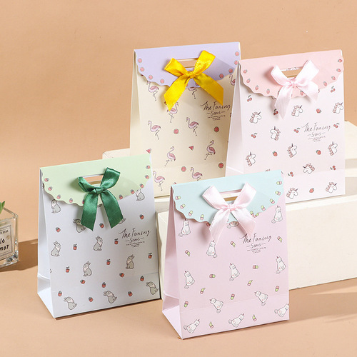 现货批发卡通款蝴蝶结白卡彩印覆亚膜礼品包装袋手提袋礼品纸袋详情4