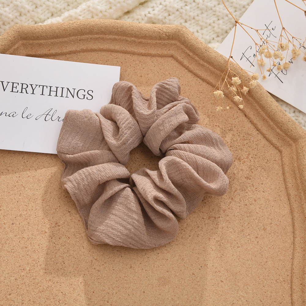 The new autumn and winter knitted cotton and linen solid-color large intestine hair band is versatile for tying ponytails, hair bands, hair accessories, bun hairstyles and hair ties pic 6