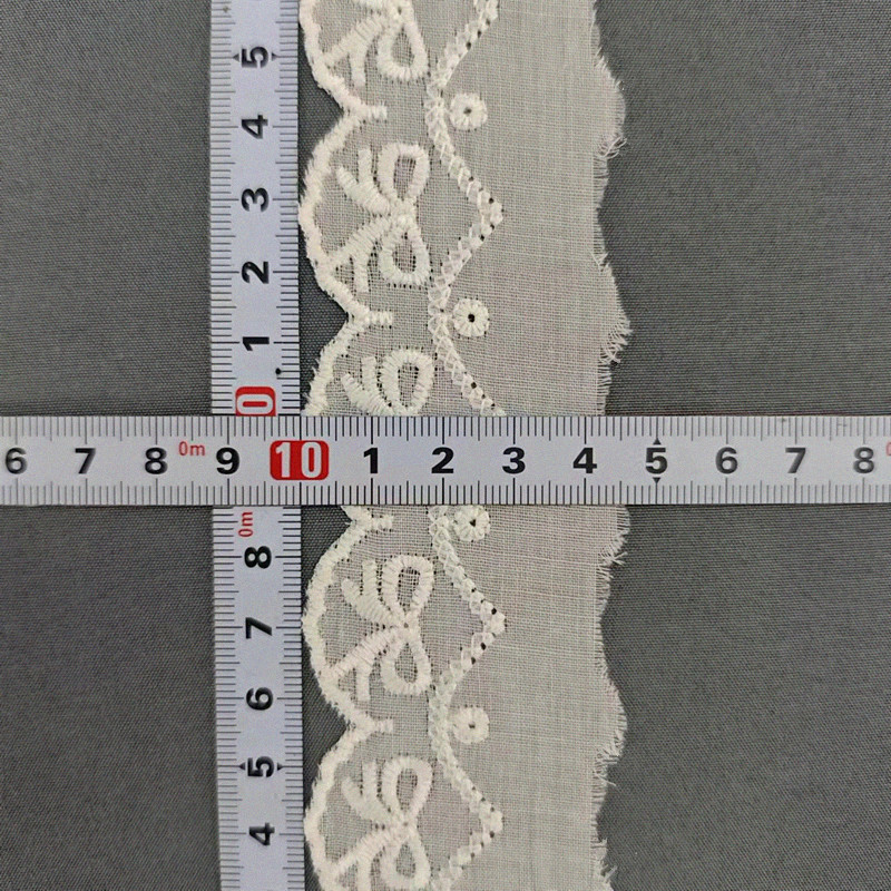 Wholesale of cotton embroidered lace, hollowed-out lace, embroidered skirt hem, clothing accessories, milk silk, perforated, barcode 2.5 pic 90