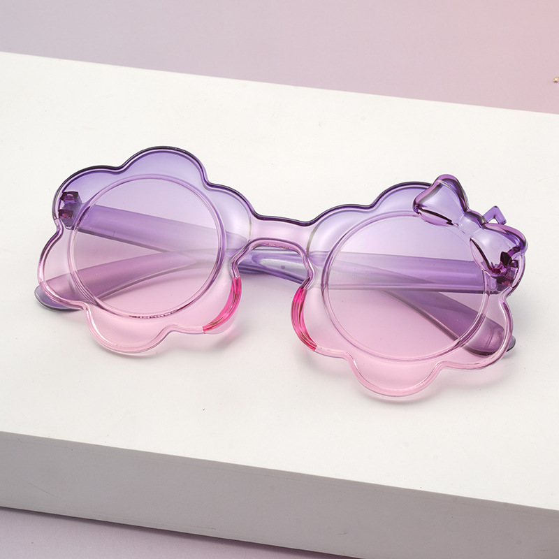 2025一体片彩色儿童太阳镜圆框小孩蝴蝶结眼镜防晒宝宝太阳花墨镜详情2