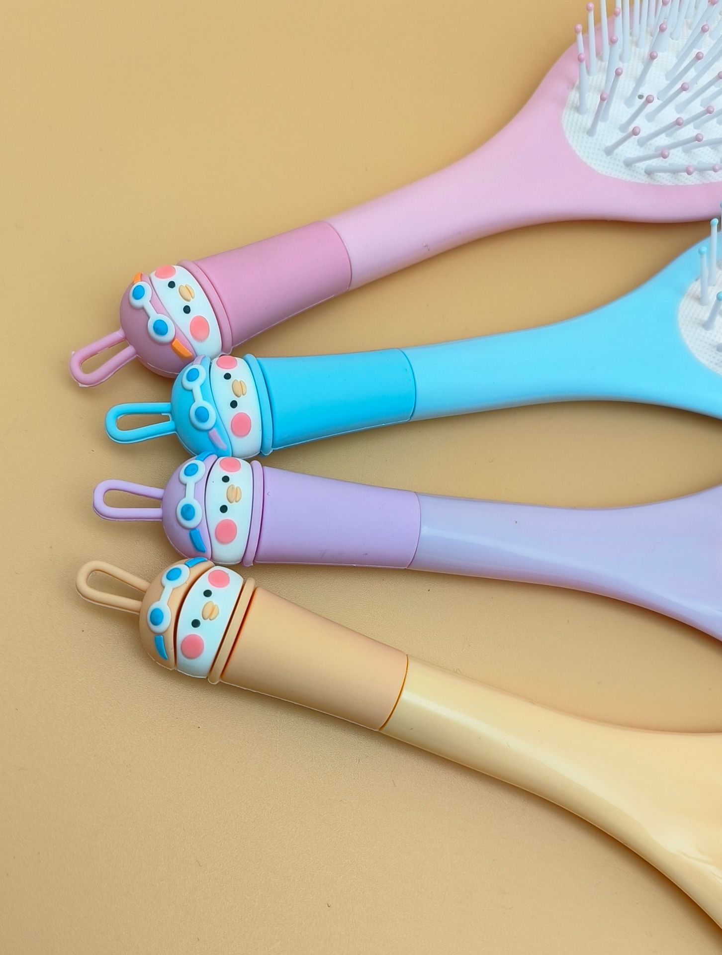 新款女生专用可爱卡通硅胶软头大方头气垫梳 蓬松造型气囊梳圆滚排骨梳 烧烤刷款式梳子详情14