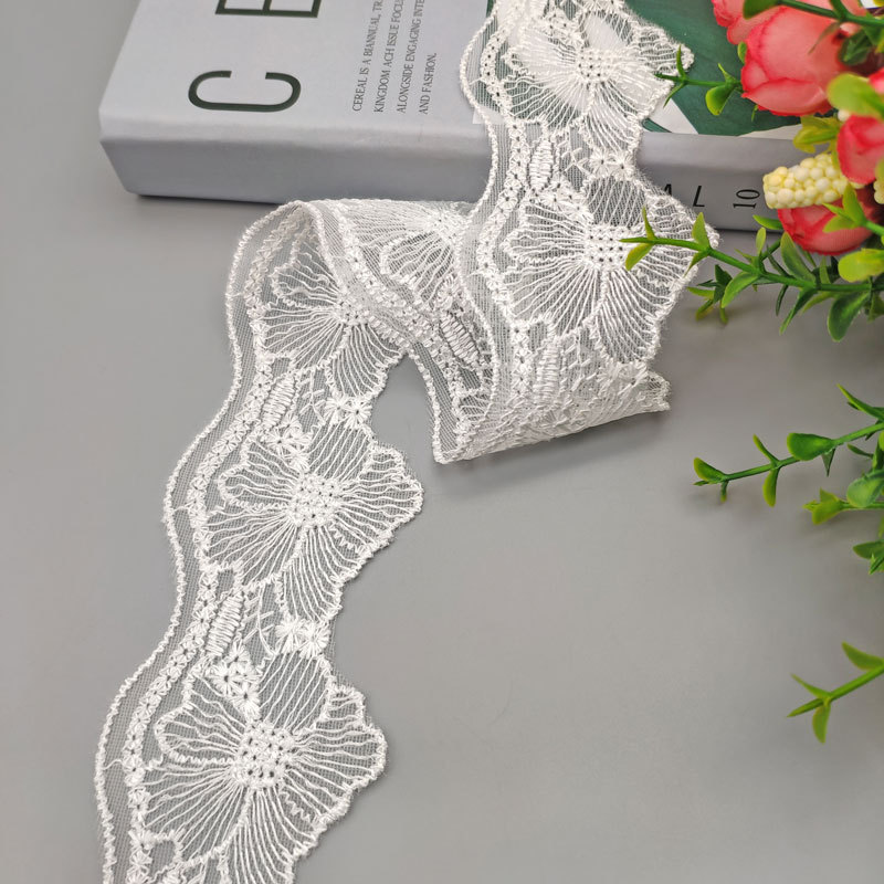 We have a wide range of products in stock, including lotus edge polyester thread embroidered lace, exquisite net lace, dance costumes, mosquito nets and decorative lace pic 9