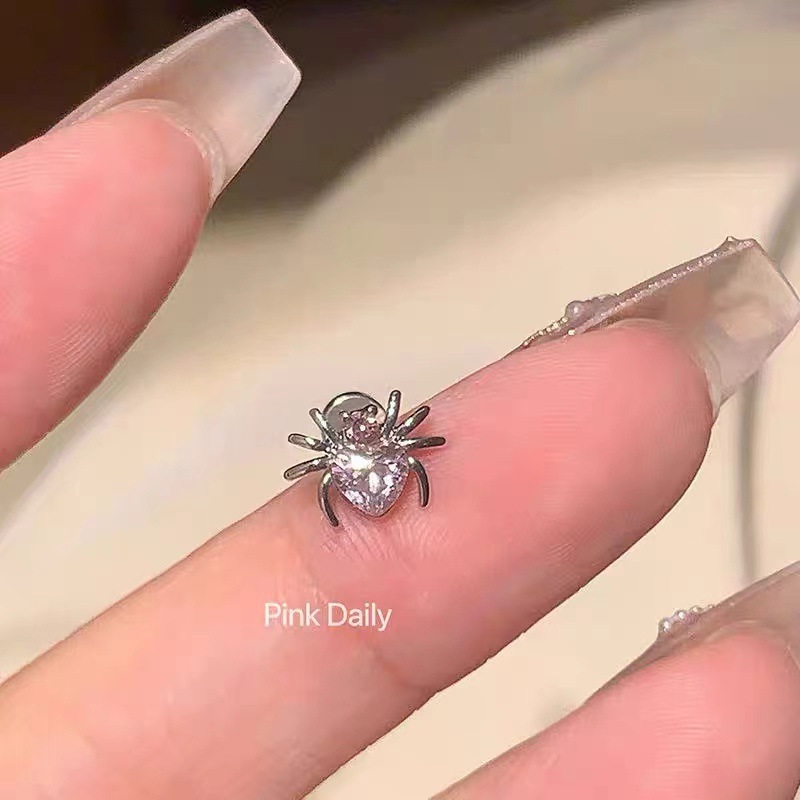 The new pink zircon cross ear bone stud titanium steel screw firework cut cochlear stud butterfly earrings are very stylish pic 9