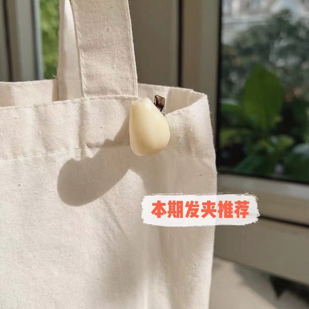 A funny and fun mini garlic hair clip, a bangs clip, and a creative garlic clove hair clip for your best friend as a gift and hair accessory pic 9