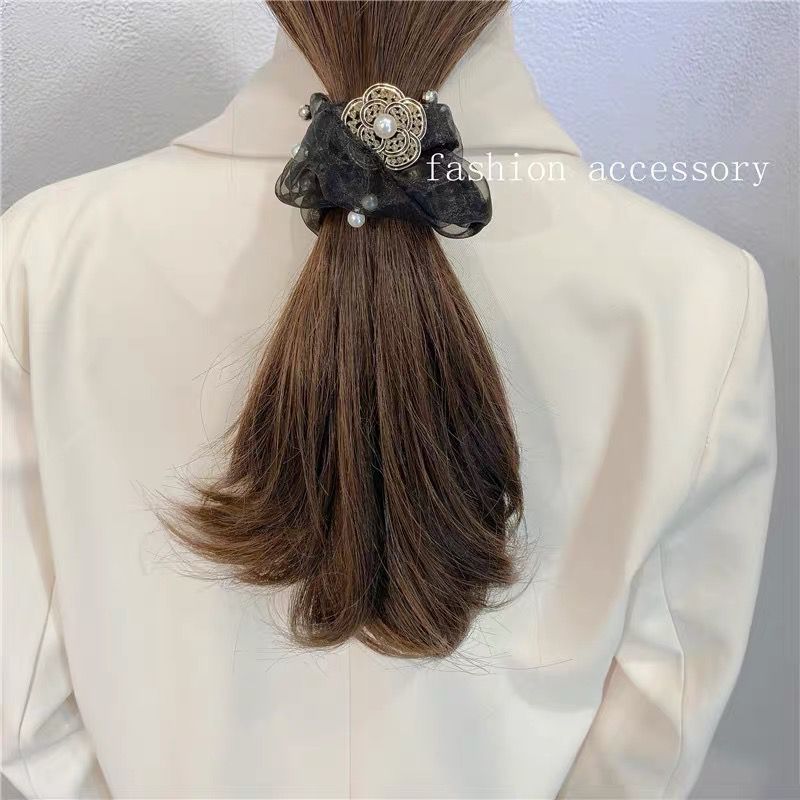 Diamond-encrusted camellia mesh large intestinal hair band Pearl ins Korean high-end style elegant hair tie for women 2023 new style pic 2