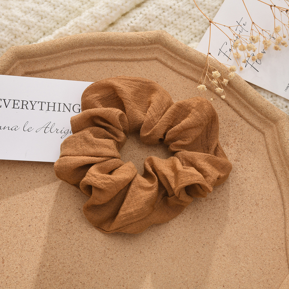 The new autumn and winter knitted cotton and linen solid-color large intestine hair band is versatile for tying ponytails, hair bands, hair accessories, bun hairstyles and hair ties pic 5