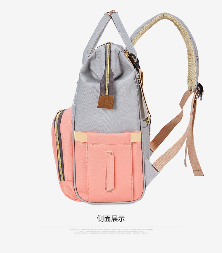 The 2021 new simple and fashionable striped mother and baby backpack can be hung on a stroller, a multi-functional mom bag, and a large-capacity maternity bag pic 25