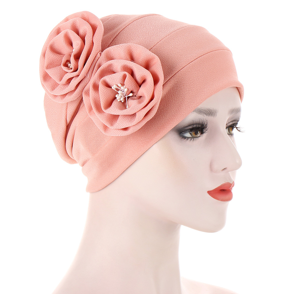 A new AliExpress style headscarf hat with two floral ribbons on the side and a flower core, a Muslim pullover hat pic 3