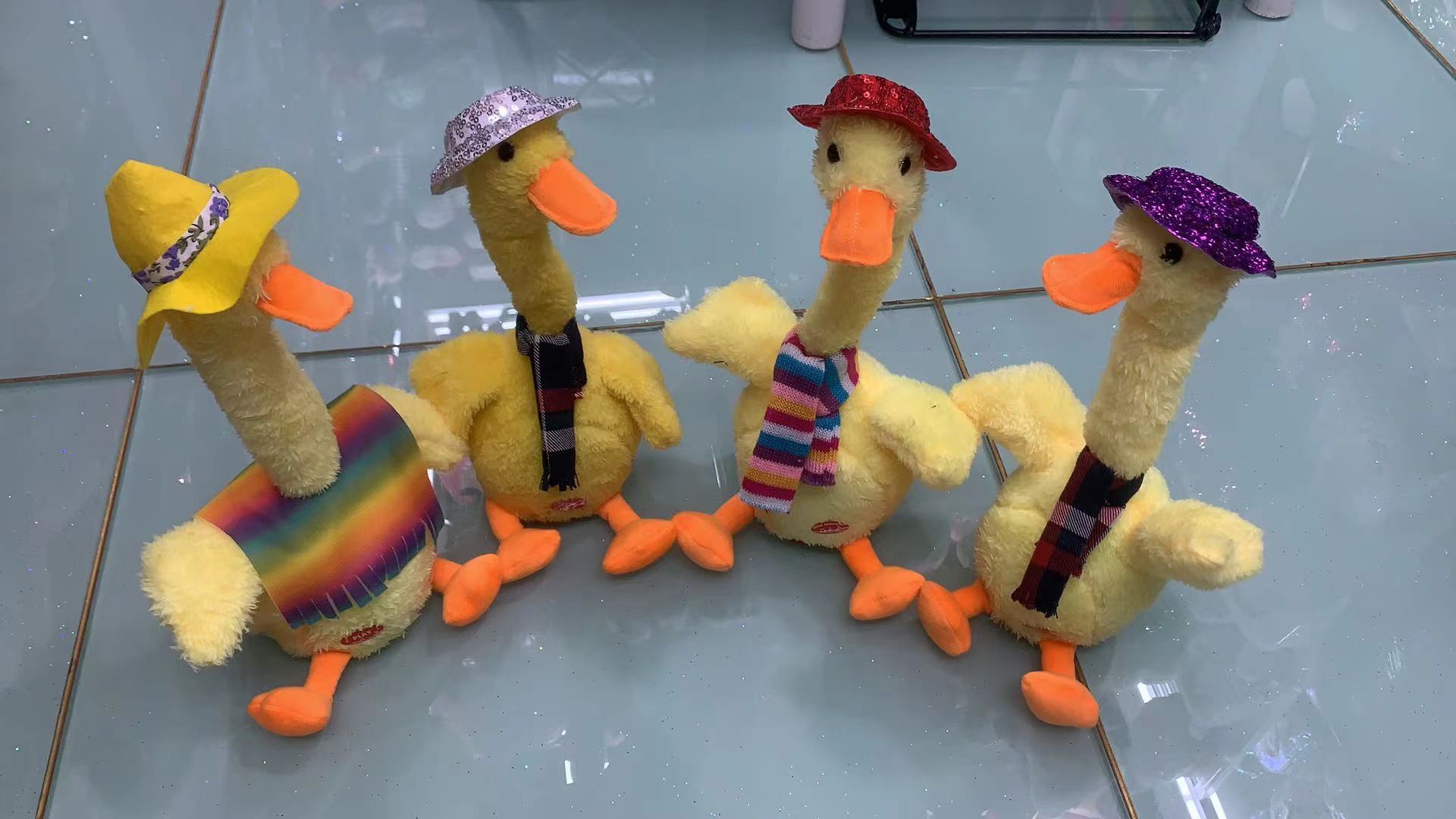 A plush sand sculpture of a talking and dancing duck that is popular on Douyin and is used to tease people pic 2