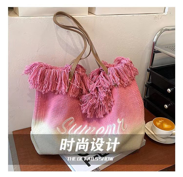 韩版春夏新款女包大容量帆布渐变编织流苏刺绣简约通勤百搭托特包详情1