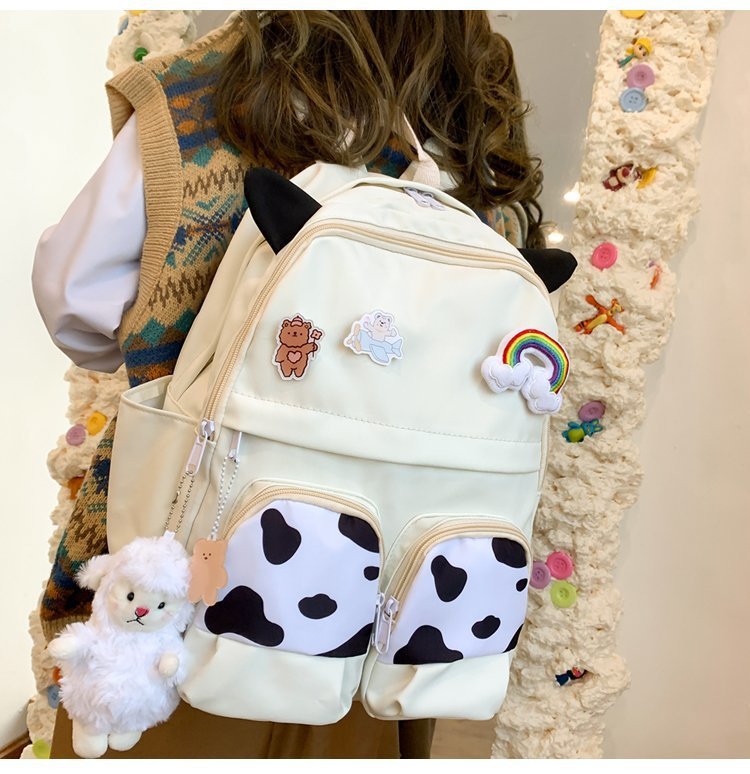 Japanese-style ins campus school style, fresh and cute, cute cow with earbuds, soft girl schoolbag, funny student backpack pic 5
