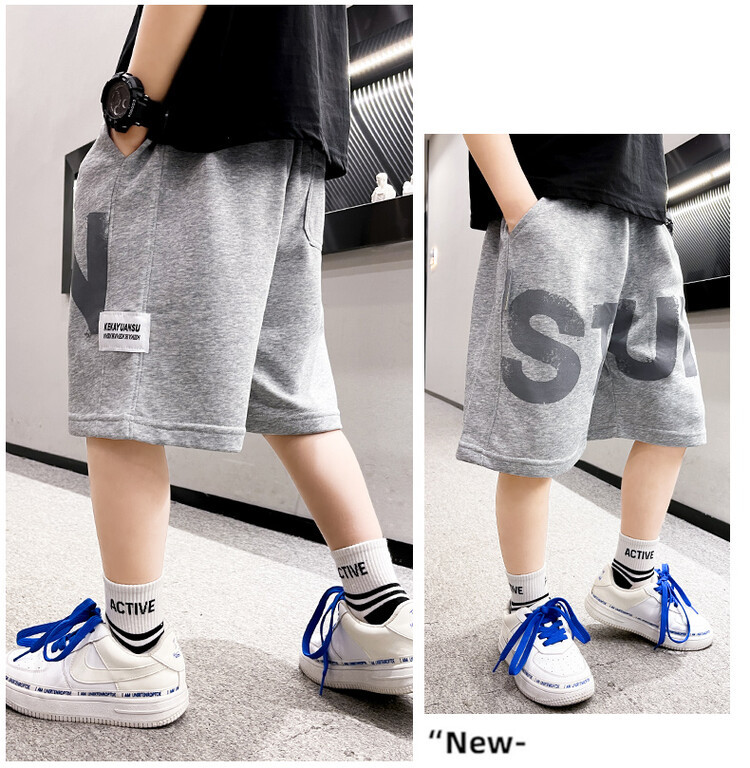The 2022 new summer loose and stylish cotton capri shorts for boys are a trend of casual summer pants for middle-aged children pic 56