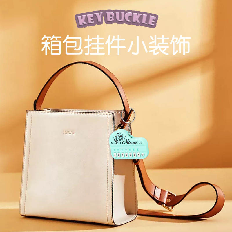 创意发光钥匙扣玩具钢琴演奏家音乐大师迷你儿童电子琴电玩游戏机详情17