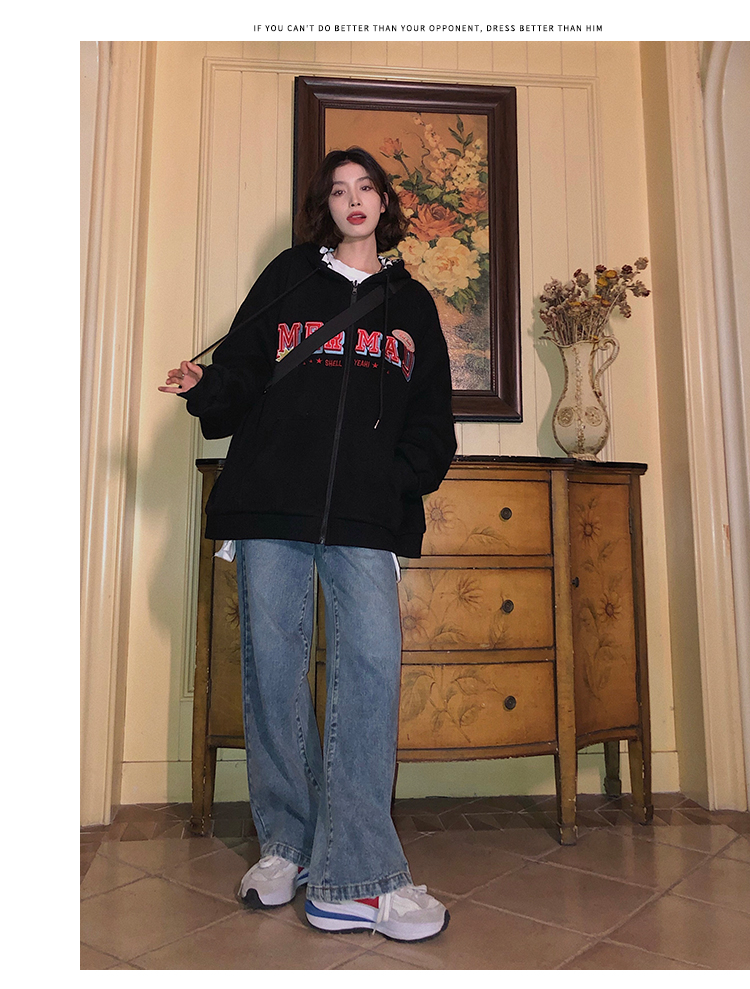 A woman wearing a cardigan with a hood on both sides in a loose pink, niche design with a checkered pattern is particularly stylish pic 9