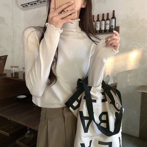 This autumn and winter round-neck leather label candy-colored pullover sweater is a unique Korean style for women, paired with a loose and slimming knitted top pic 13