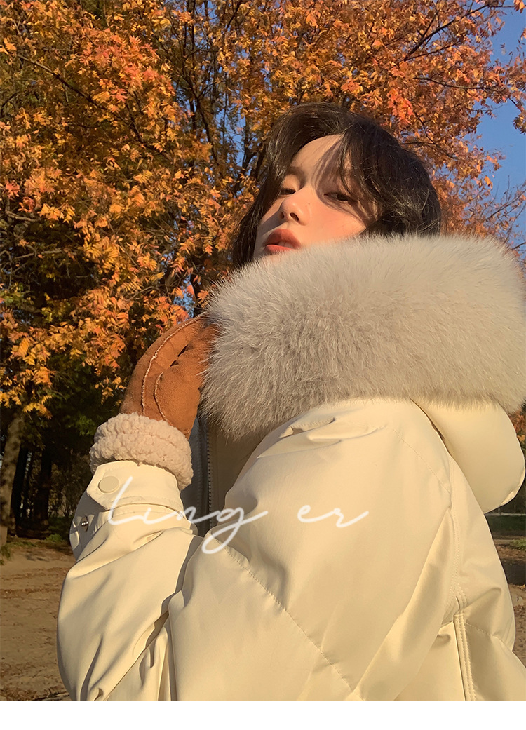 Wholesale of high-end mid-length down jackets for women that reach the knees in 2022, featuring a fashionable design sense and a niche thickened coat pic 48