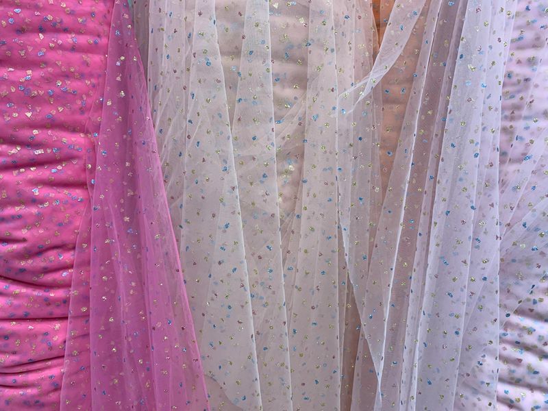 Wholesale of knitted mesh fabric for clothing, toys, puffy skirts, headwear, hair accessories, butterfly knot mesh fabric, and three-color mesh gauze pic 3