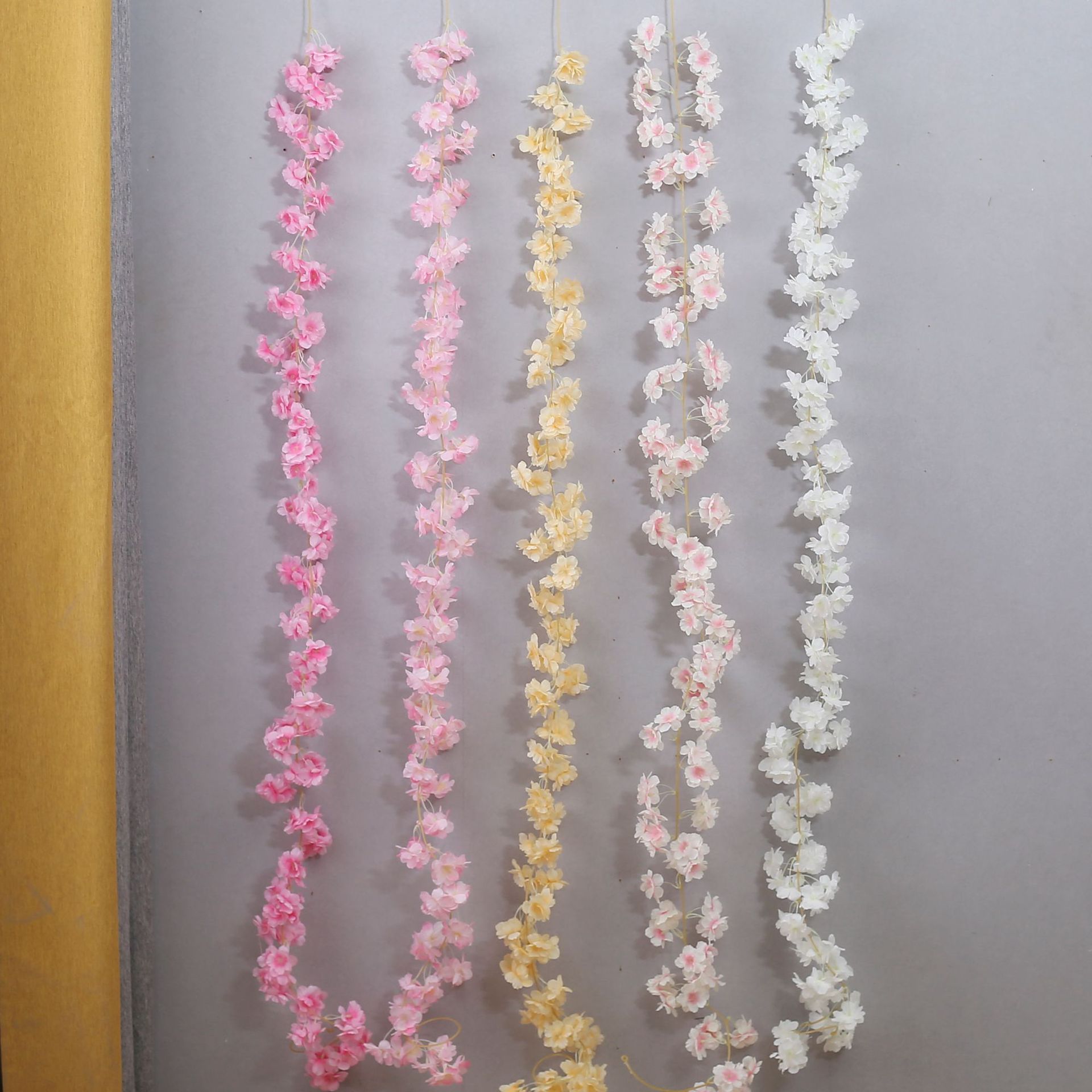 Cherry blossom vines entwined around air conditioning pipes, covering flower stalk trees, simulated peach blossoms, decorative flower vines, artificial flower vines pic 5