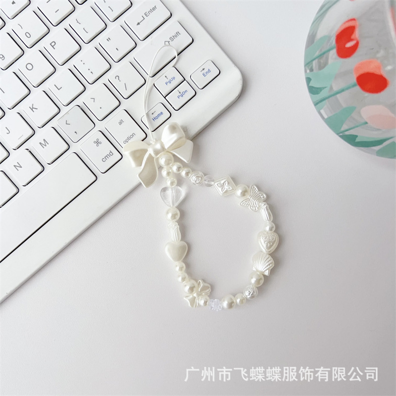 新款仙女风手机挂绳亚克力珍珠串珠蝴蝶结配饰甜美短款链防丢防摔详情4