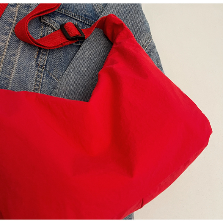 防水尼龙布袋斜挎包2024新款百搭饺子包简约百搭大容量上课单肩包详情20