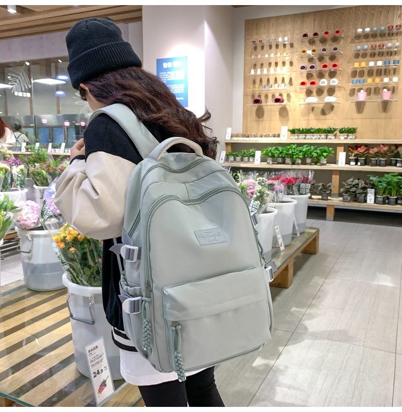 纯色休闲双肩包小学生女初高中书包简约时尚百搭大容量大学生背包详情24