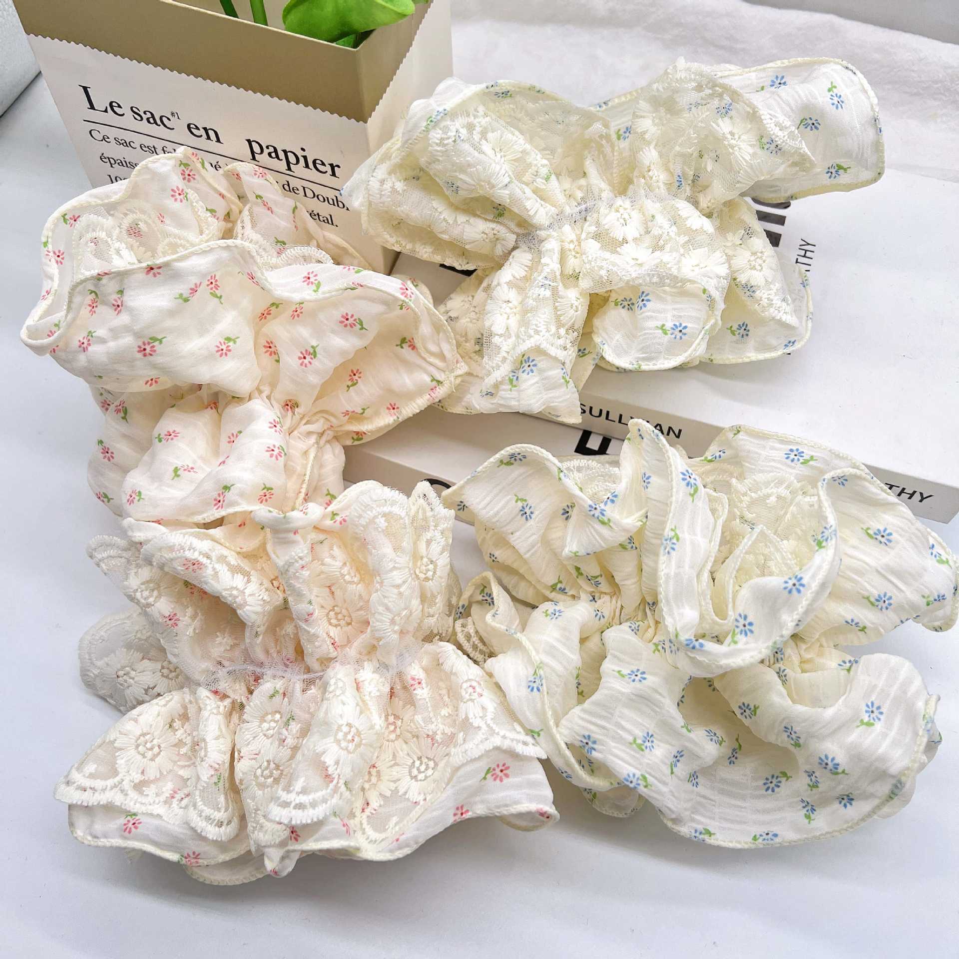 A retro French large intestine hair band for a woman with a simple and elegant ponytail bun. A hair tie, hair band, hair band and hair accessory for a woman pic 6