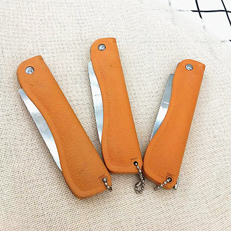 Factory direct sales of folding yellow sleeve knives, multi-functional folding knives, fruit knives wholesale two-yuan products pic 4