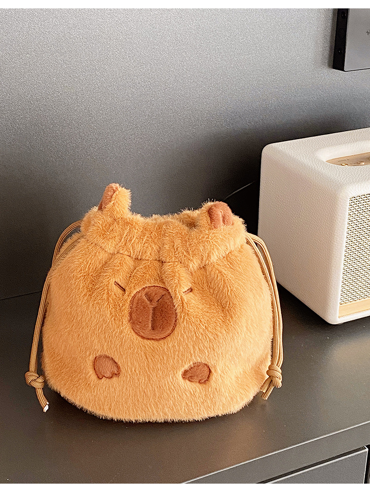 ✅ Cute plush kapibara drawstring pocket travel cosmetics camera polaroid storage bag hand pic 3