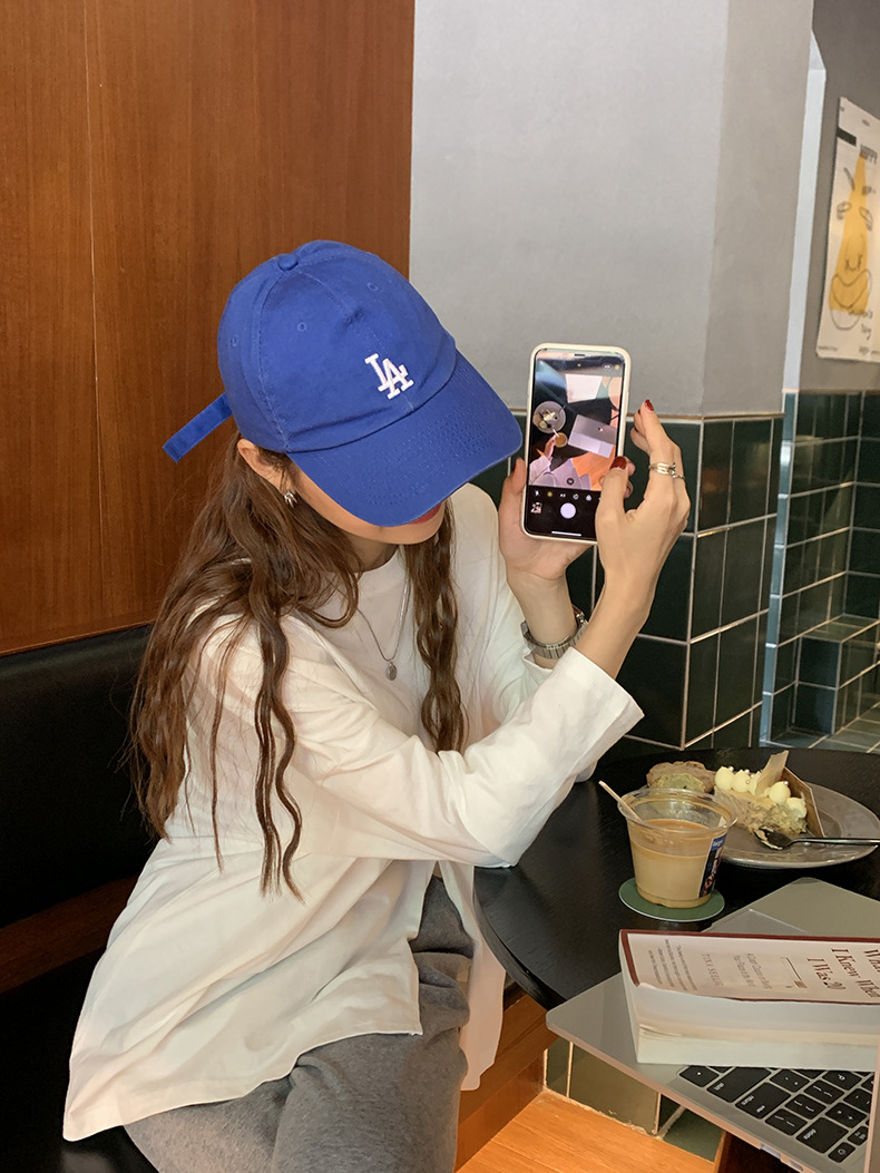 黄峥简约贴标开叉长袖T恤女2022春韩版宽松休闲设计感上衣T85396详情21