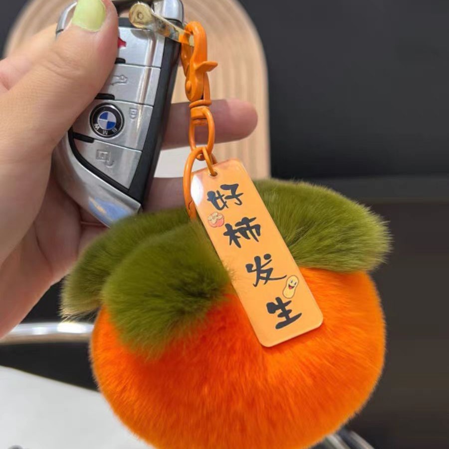 Wholesale of plush persimmon car pendants, creative decorative keychains, birthday gifts, and trendy accessories pic 4