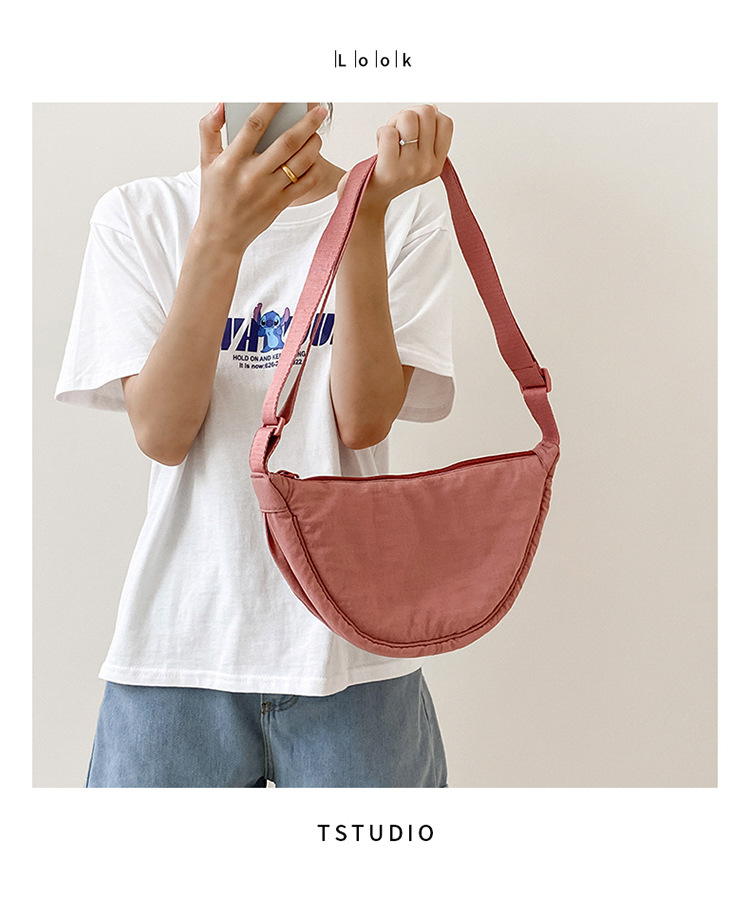 斜挎包女新款单肩包学生女包休闲包运动小包夏季帆布包日系饺子包详情1