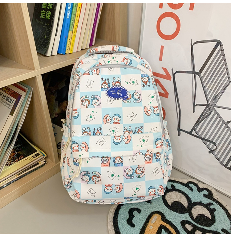 简约校园休闲背包2023韩版大容量休闲双肩包日系个性涂鸦学生书包详情25