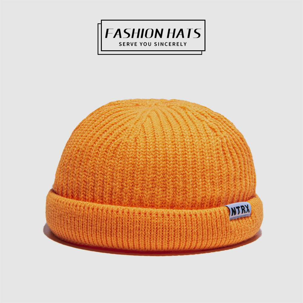 For the autumn and winter of 2021, men and women are wearing Korean-style outdoor casual hats without brims, with rolled edges and round top warp knitted caps pic 3