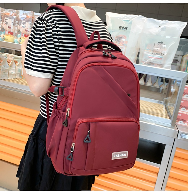 纯色学生书包女批发轻便大容量中大学生双肩包女3-6年级校园背包详情23