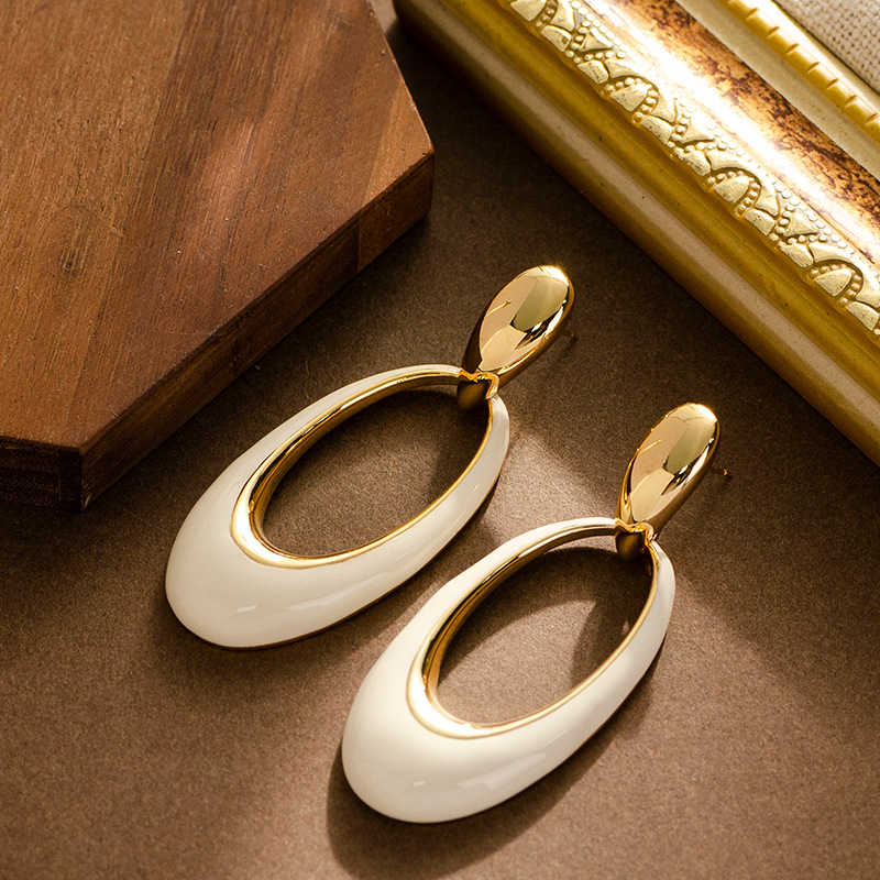 French elegant, retro, mid-style oil-dripping, hollowed-out geometric oval earrings, a niche and unique design sense, silver needle earrings pic 6