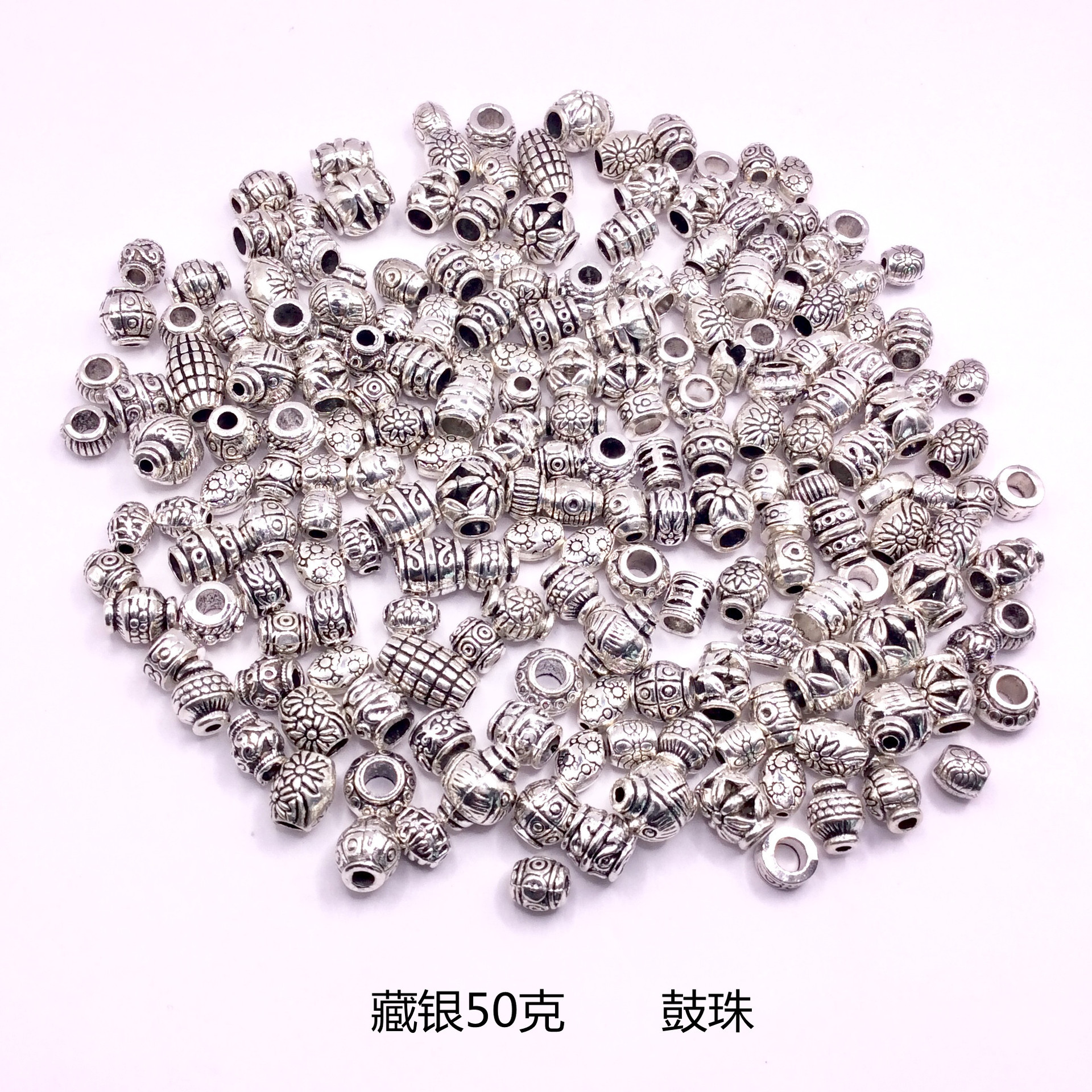 A 50g mixed bag of Tibetan silver bracelets, pendants, alloy jewelry accessories, diy flower trays, spacers, and drum beads pic 4