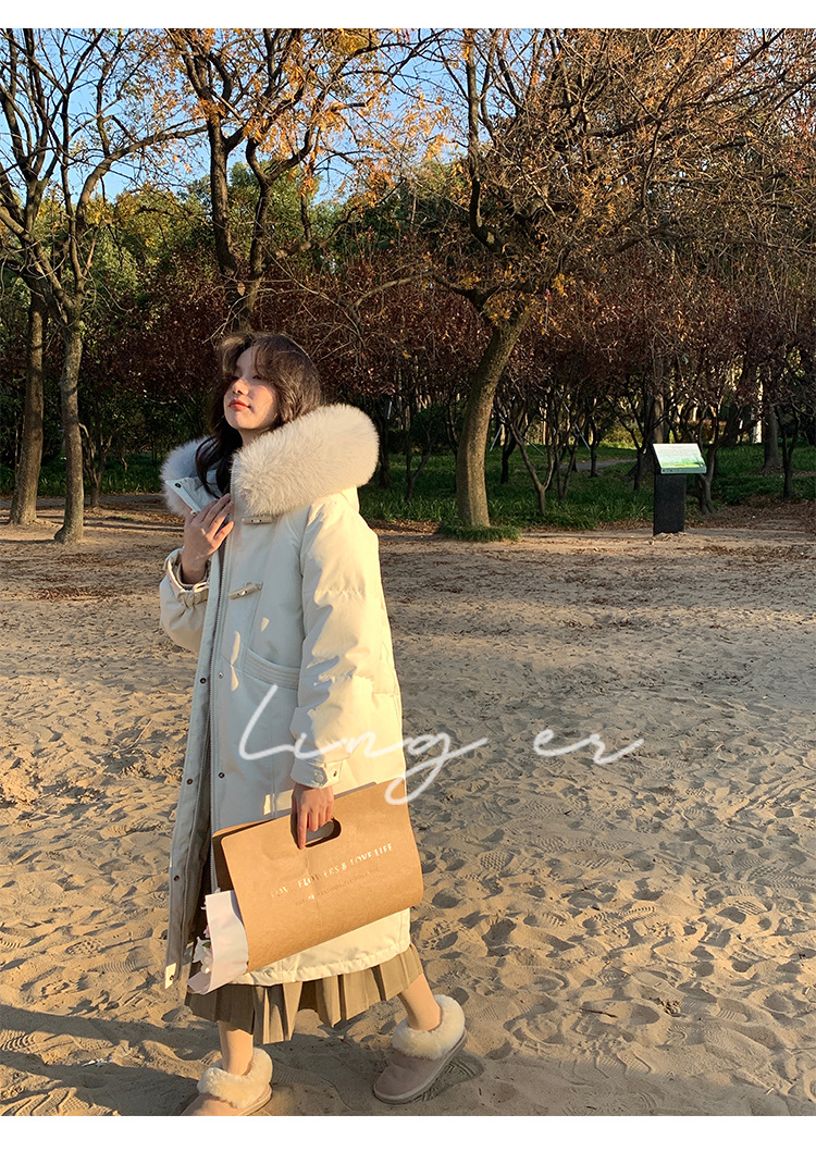 Wholesale of high-end mid-length down jackets for women that reach the knees in 2022, featuring a fashionable design sense and a niche thickened coat pic 53