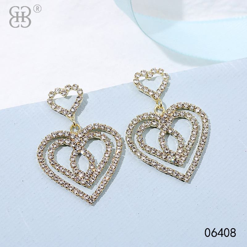 New French high-end heart-shaped diamond-encrusted light luxury earrings, exquisite, fashionable and versatile water diamond melon chain earrings wholesale pic 9