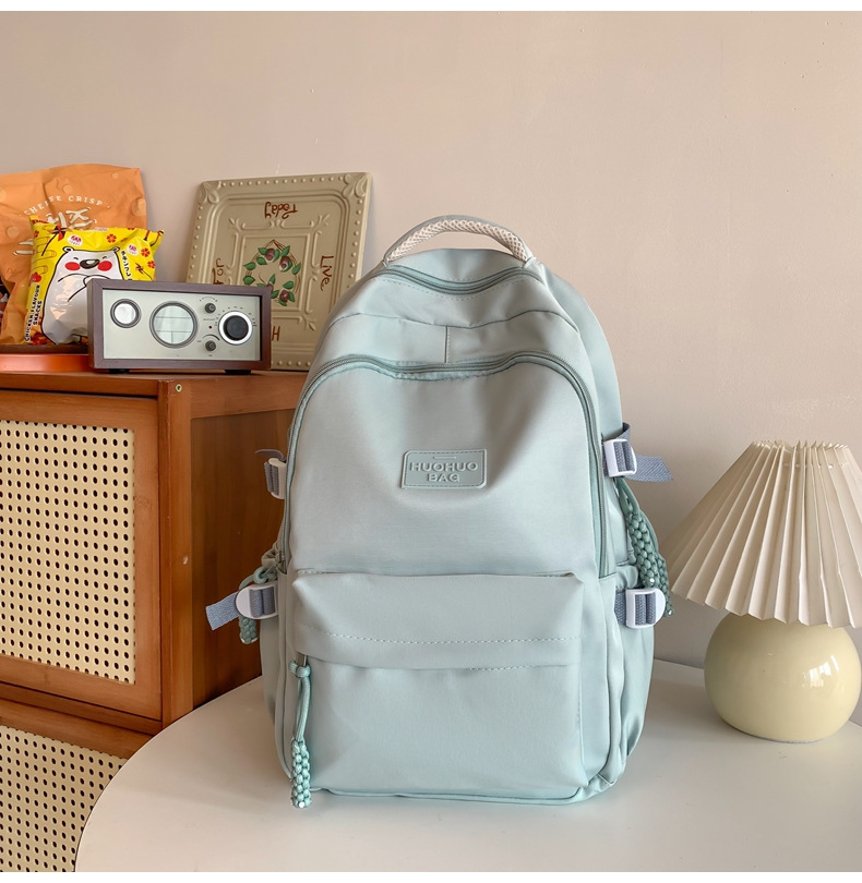 纯色休闲双肩包小学生女初高中书包简约时尚百搭大容量大学生背包详情35