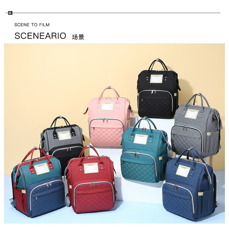 Nuevo modelo mommy bag cama cama plegable baby bag mamá multifuncional recargable impermeable bordado hilo mochila cama cross-border blast pic 20