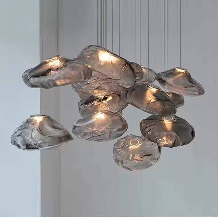 تصميم جديد من تصميم ما بعد الحداثة على شبكة الإنترنت مصمماً بسيطاً مصمماً، وهو عبارة عن ثريات من السحب في مطعم فندقي pic 6