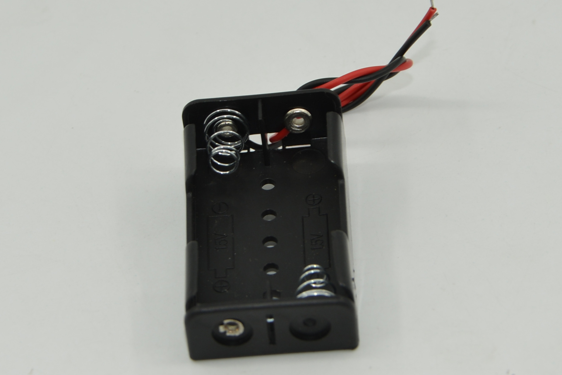 Two AA battery boxes, uncovered with wires, black power supply, positive and negative DC power supply, student experiment science physics pic 2