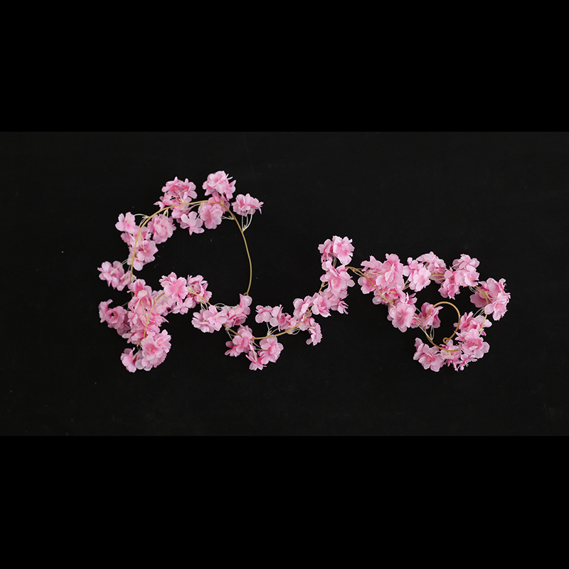 Cherry blossom vines entwined around air conditioning pipes, covering flower stalk trees, simulated peach blossoms, decorative flower vines, artificial flower vines pic 7